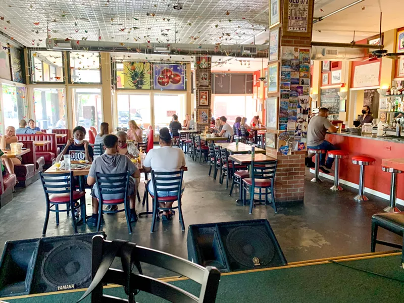 Image: Dining rooms have spaced-out tables these days, but plenty of people are still choosing to stay home.