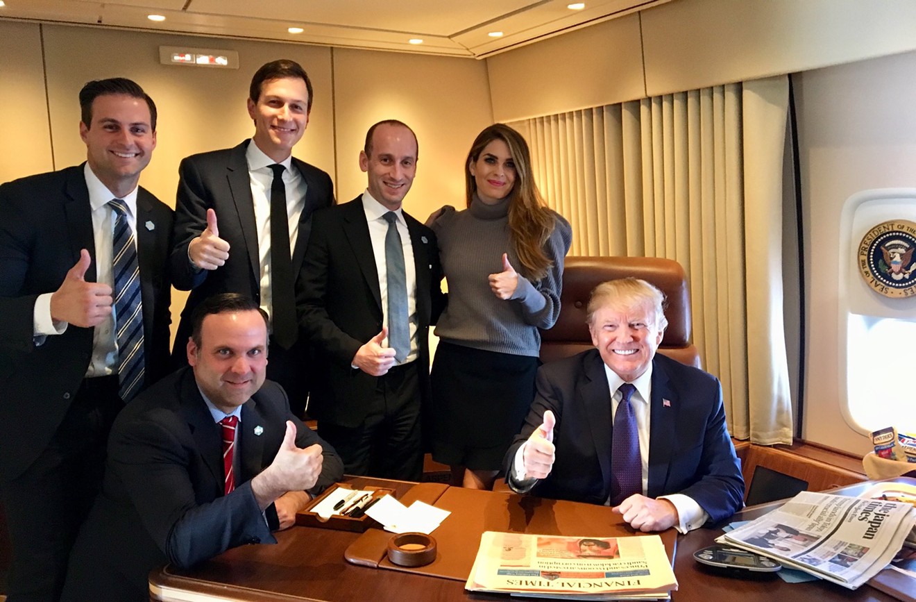 Hope Hicks, second from right, on Air Force One with Donald Trump and his staff.