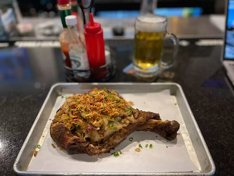 Image: A brined and marinated turkey leg stuffed with Asian sticky rice.