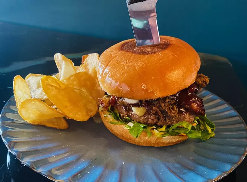 Image: Paddy’s burger comes topped with pot roast, Irish cheddar cheese, a Guinness sauce and onion rings.