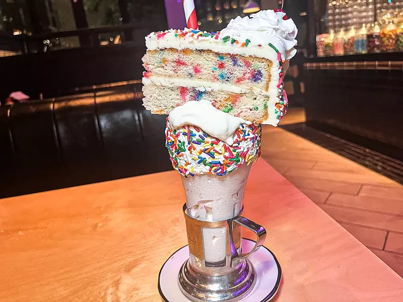 Image: The CakeShake is a customer favorite, topped with an entire slice of birthday cake and rimmed with sprinkles.