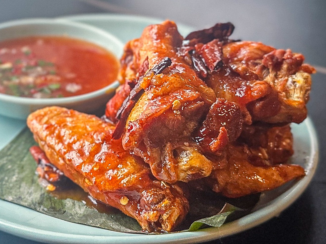 Tom yum chicken wings are a tasty option that doesn't need the accompanying sauce.