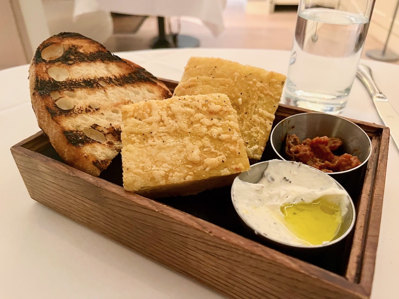 A basket of bread is complimentary; go ahead and eat up.