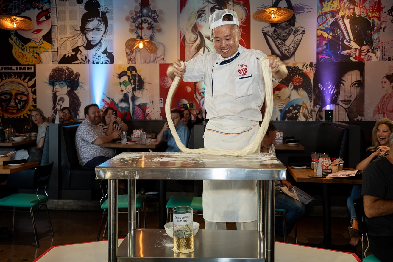Chef Charlie Zhang puts on a noodle show in the dining room at Wok Star.