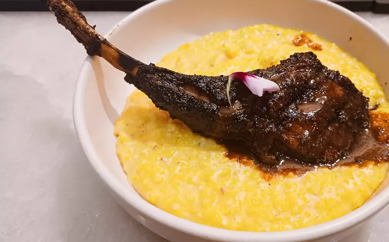 Image: Bone-in pork chop atop a Meyer lemon gel at Nine.