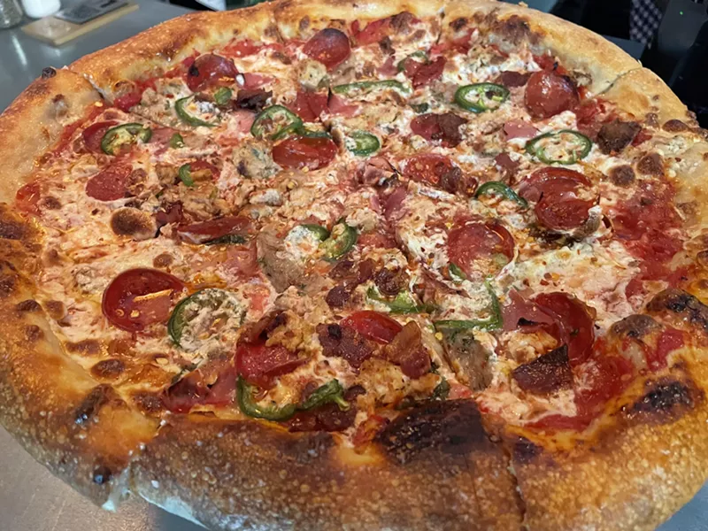 Image: The Carnivore comes with sausage, pepperoni, chicken meatballs, ham, bacon, and jalapeños.