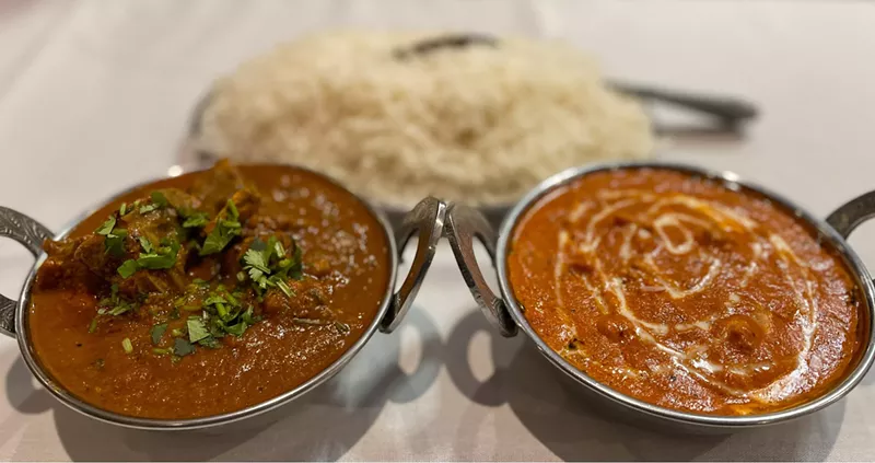 Image: Butter chicken and goat curry