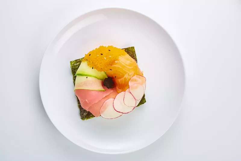 Image: The poke doughnut at the new Poke Bop is one of those kooky hybrid foods that Instagrammers love to love.