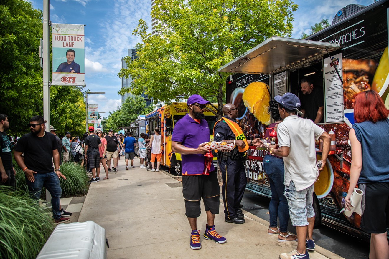 Klyde Warren Park visitors eat at food trucks on Memorial Day 2019.