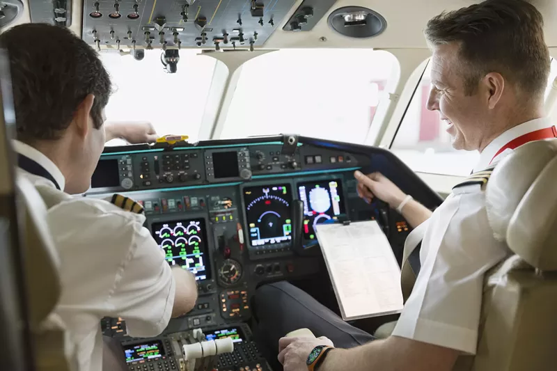 Image: A pilot said it was a top-secret security system, the flight attendant claims.