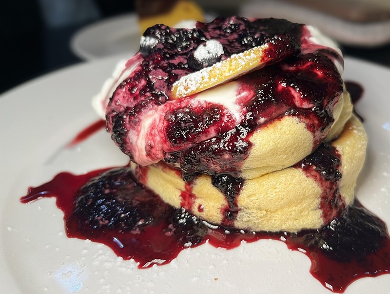 A stack of Japanese-style Blueberry Cheesecake pancakes enjoyed on a visit to Fluffy Fluffy's Frisco location.