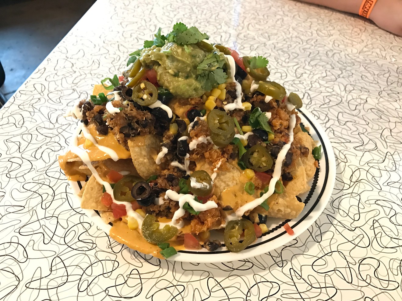 The nachos are the most popular dish "by far" since debuting as a blue plate special early in the 2000s.