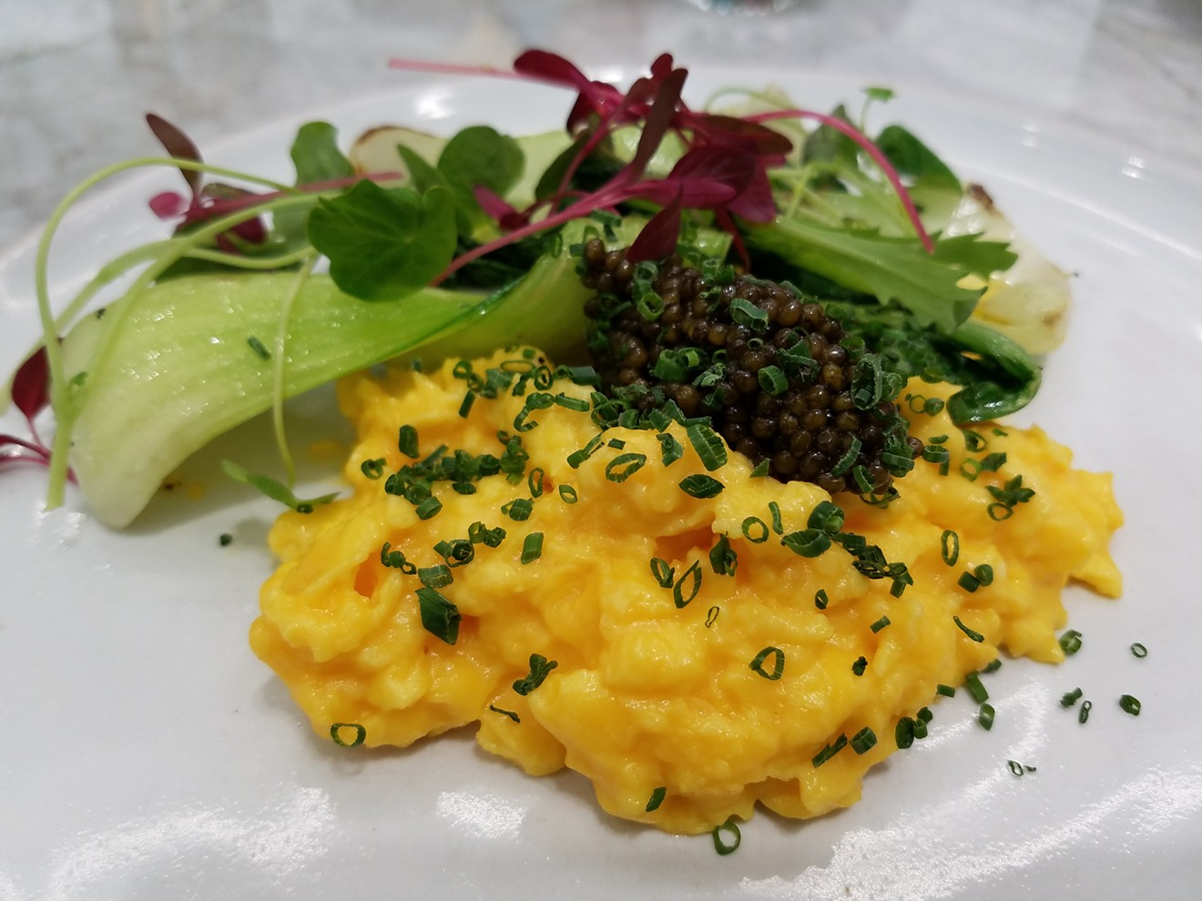 Salty pebbles of caviar beautifully offset a perfectly soft, silky French-style scramble ($24).