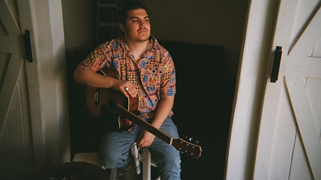 Fort Worth's Julián Cedillo, aka WACHO!, with guitar