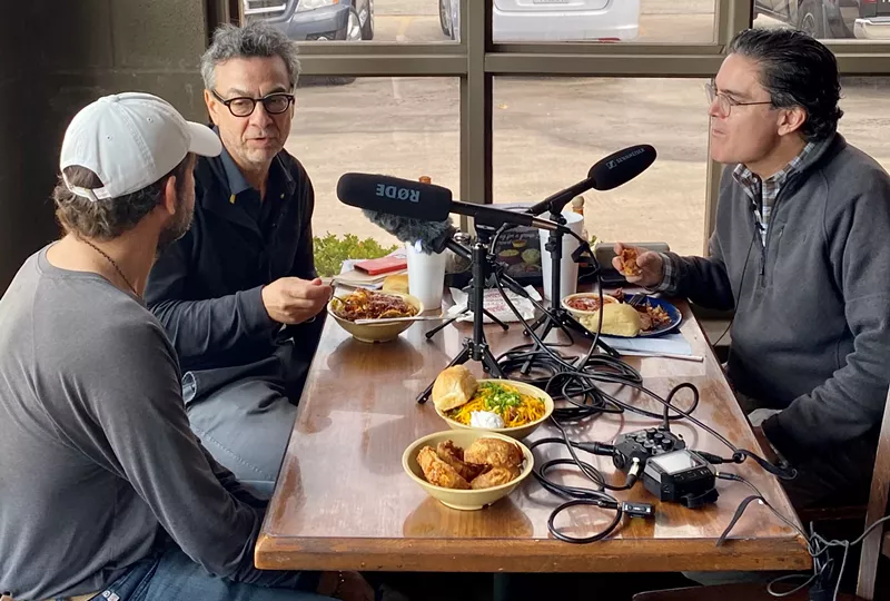 Image: Freakonomics Radio host Stephen Dubner (top left) gets his literal first taste of Dallas at Sonny Bryan's Smokehouse with the restaurant's owner Brent Harman (left) and George W. Bush Institute-S.M.U. Economic Growth Initiative director Cullum Clark. The meeting is for an interview for a special two-part series on what's behind the explosive population growth across DFW.