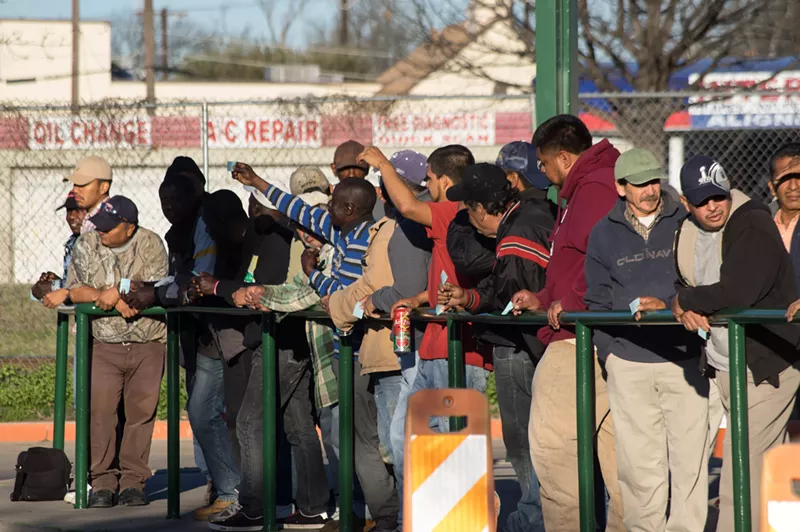 Image: Laborers wait for work at the Garland Day Labor center.