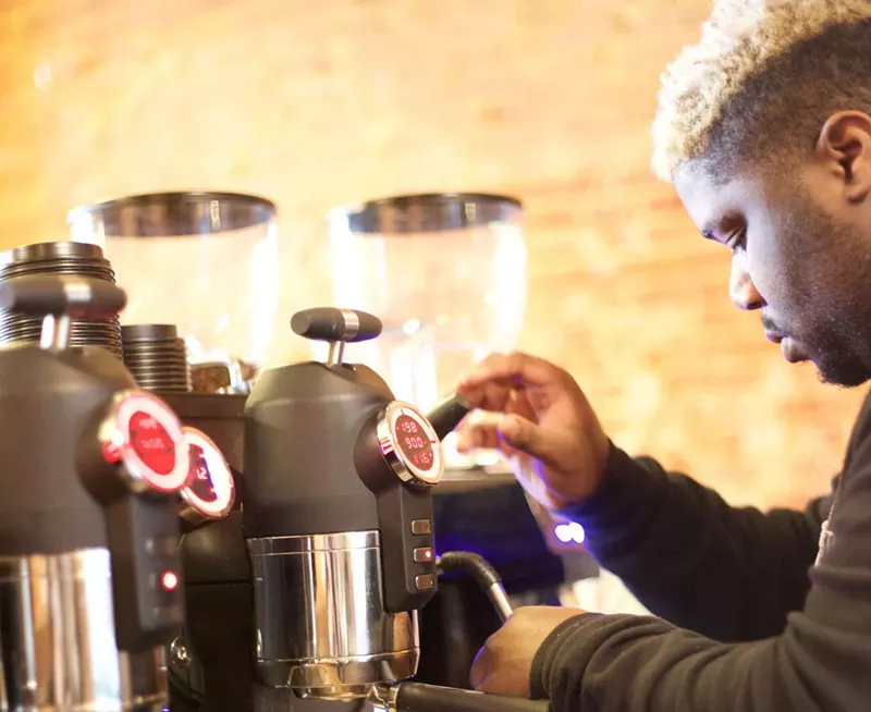 Image: Dee "Walt Deezy" Traylor pulling shots of his Ultralight Beans at Rosalind in Garland.
