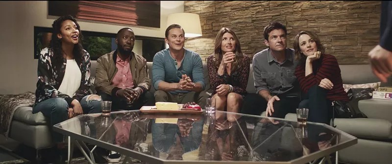 Image: Jason Bateman (second from right) and Rachel McAdams (right) star as the perfect couple who play to win in Game Night, with a cast that includes (from left) Kylie Bunbury, Lamorne Morris, Billy Magnussen and Sharon Horgan.