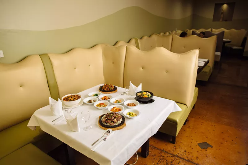 Image: Curl up in one of Sura Korean Bistro’s booths and get ready to fill up on Korean barbecue and banchan.