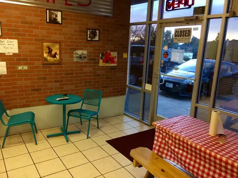 Image: You don't get much more straight-forward than Nate's BBQ, which only has two tables but makes some damn fine barbecue from out of a smoker trailer.