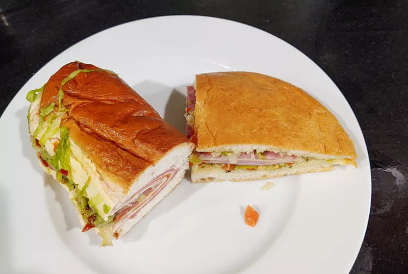 Image: Half a Stallion (left) and muffuletta from Jimmy's Food Store in East Dallas