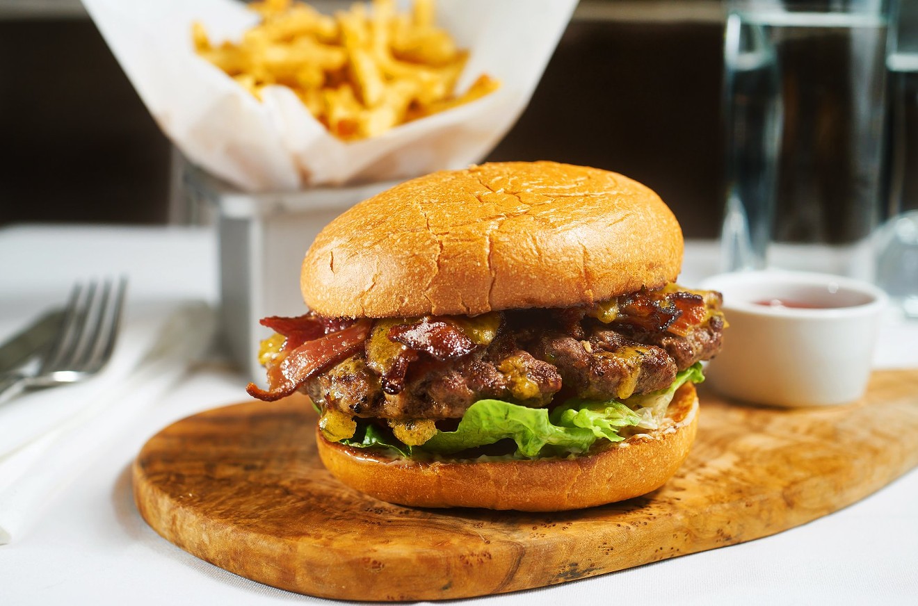 The toppings change every day for the cheeseburger at Parigi. It's $14 with perfect french fries.