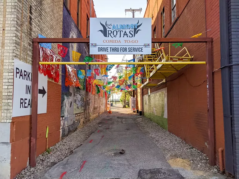 Image: The entry to Las Almas Rotas' drive-thru, before construction crews got to work and before the team added a colorful banner over the service door.