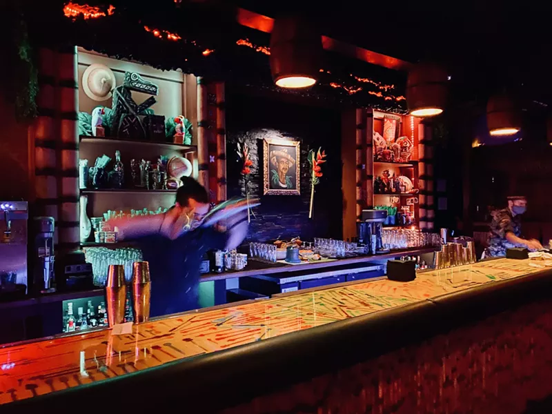 Image: The bar and cocktail shaking at Swizzle