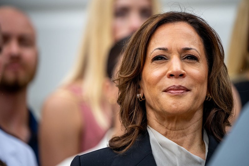 Is U.S. Vice President Kamala Harris, seen here attending an NCAA championship teams celebration on the South Lawn of the White House on July 22, Black enough? Donald Trump has his doubts.