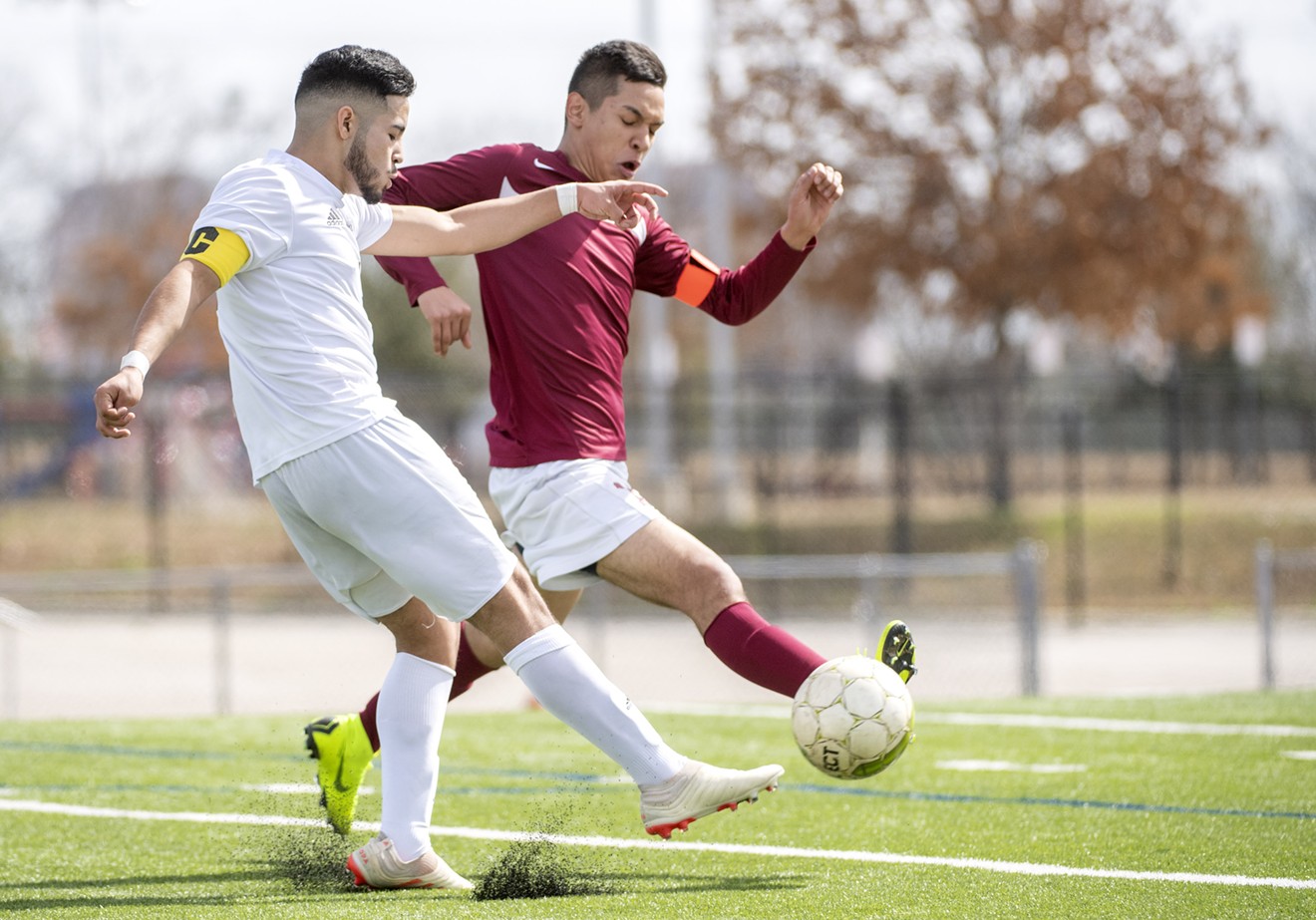 Thomas Jefferson junior defender Eduardo Flores competes for the ball against a Woodrow Wilson player, in February 2019 in Addison.