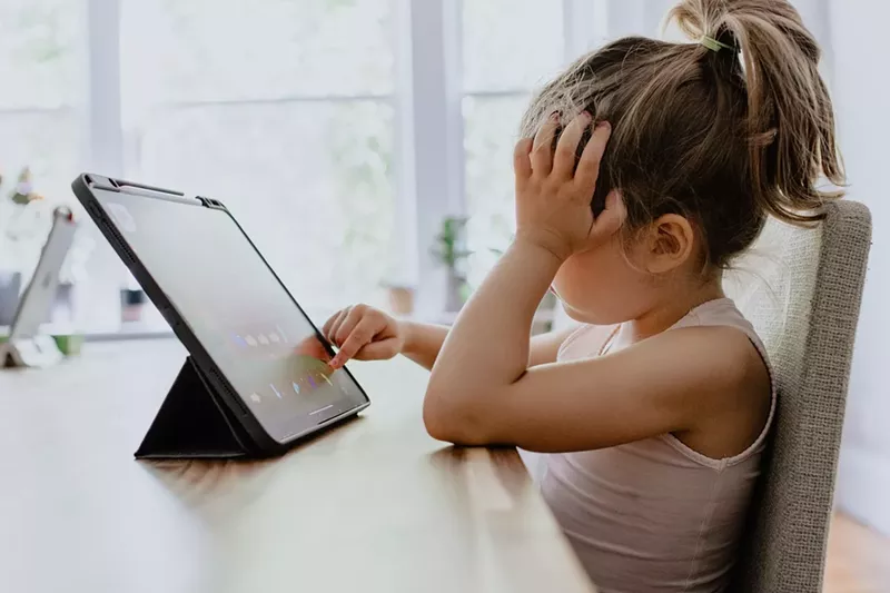 Image: kid on computer