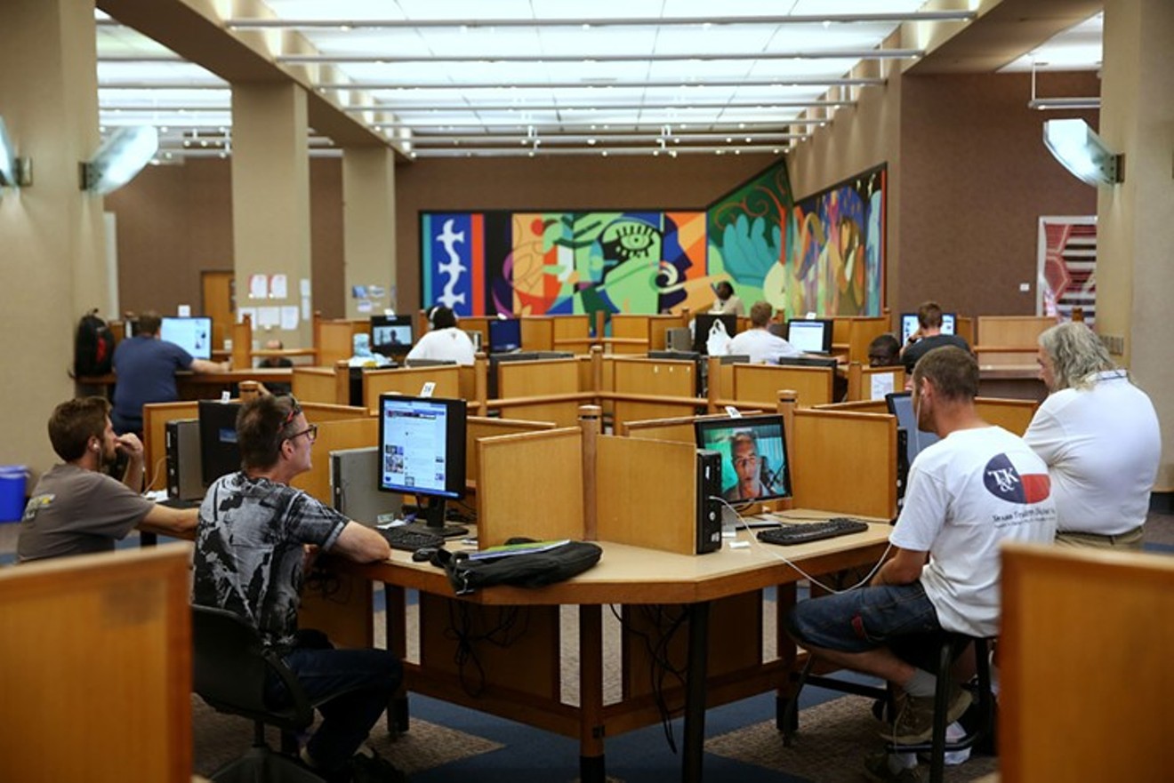Computer stations at Dallas' central library, which is open again.