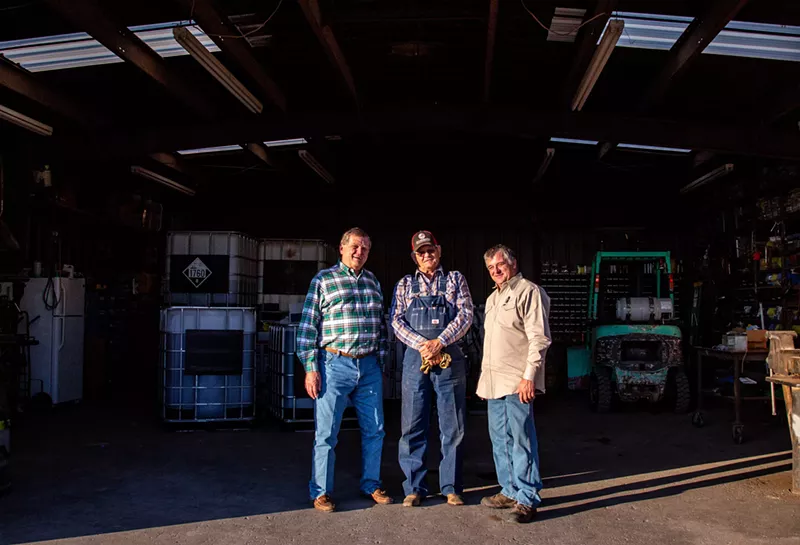 Image: Barry Mahler, Larry McAlister and Kenneth McAlister tell tales of the wild ups and downs of farming in Larry McAlister’s garage.