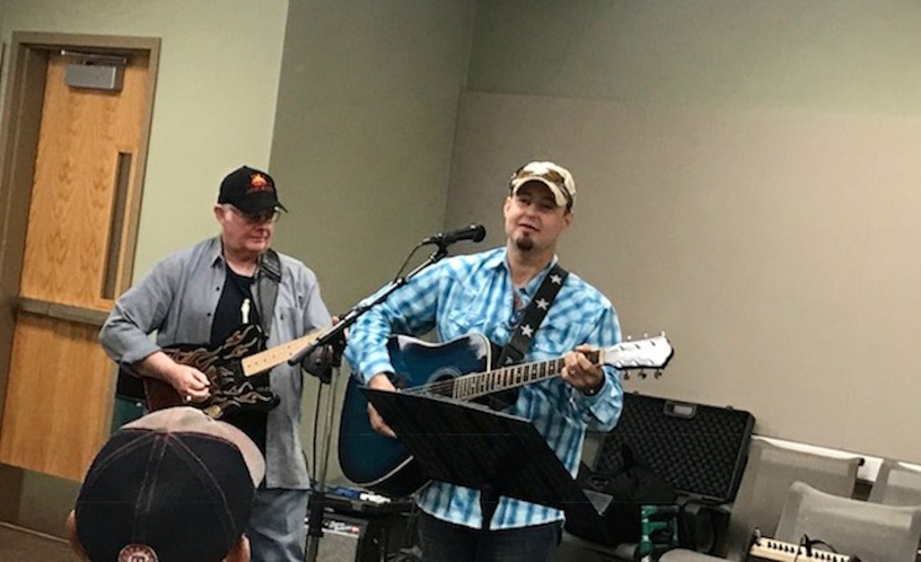 Navy Vietnam Veteran Lindell Thomas (left) performs with Taylor Bonham (right). Bonham wrote "Same Star," an award-winning song, in the Guitars for Heroes program.