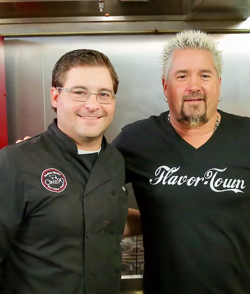 Image: One90 Smoked Meats owner Kyle St. Clair (left) appeared in Guy Fieri's Diners, Drive-Ins and Dives in 2018.