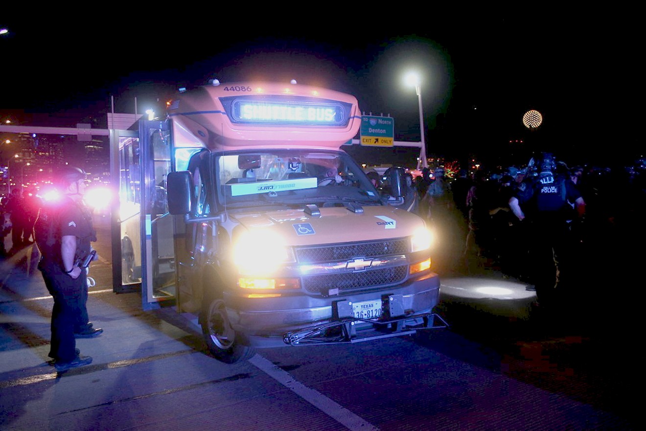 Police loaded protesters onto several Dallas Area Rapid Transit buses Monday night.