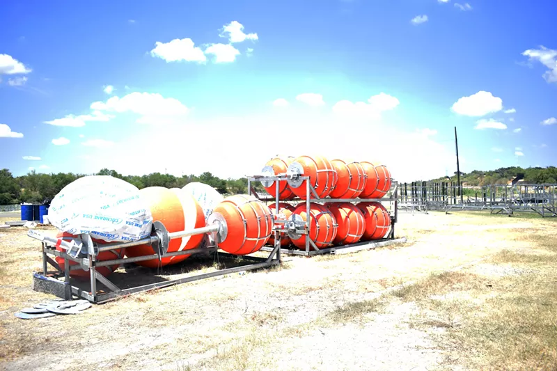 Image: Buoys located in Shelby Park in Eagle Pass, which is still open to the public. The buoys were about four feet wide and tall, and had round metal pieces in the center that resembled saw blades.