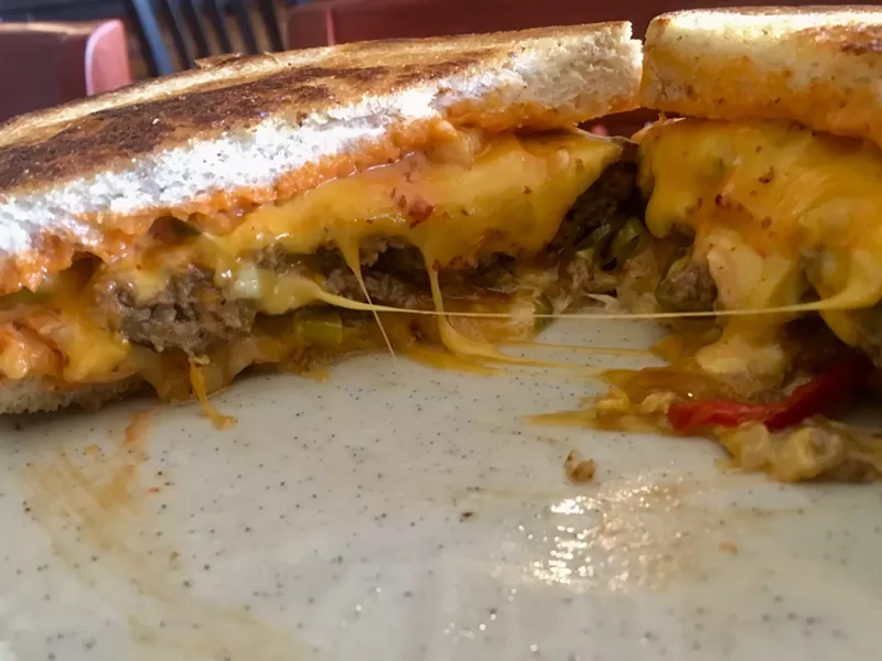 Image: The four cheese patty melt at Hillside Tavern is served on toasty sourdough for $10. No more, no less.
