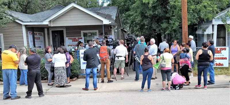 Image: Monday's announcement of a deal to sell HMK houses to the tenants was a major media event.