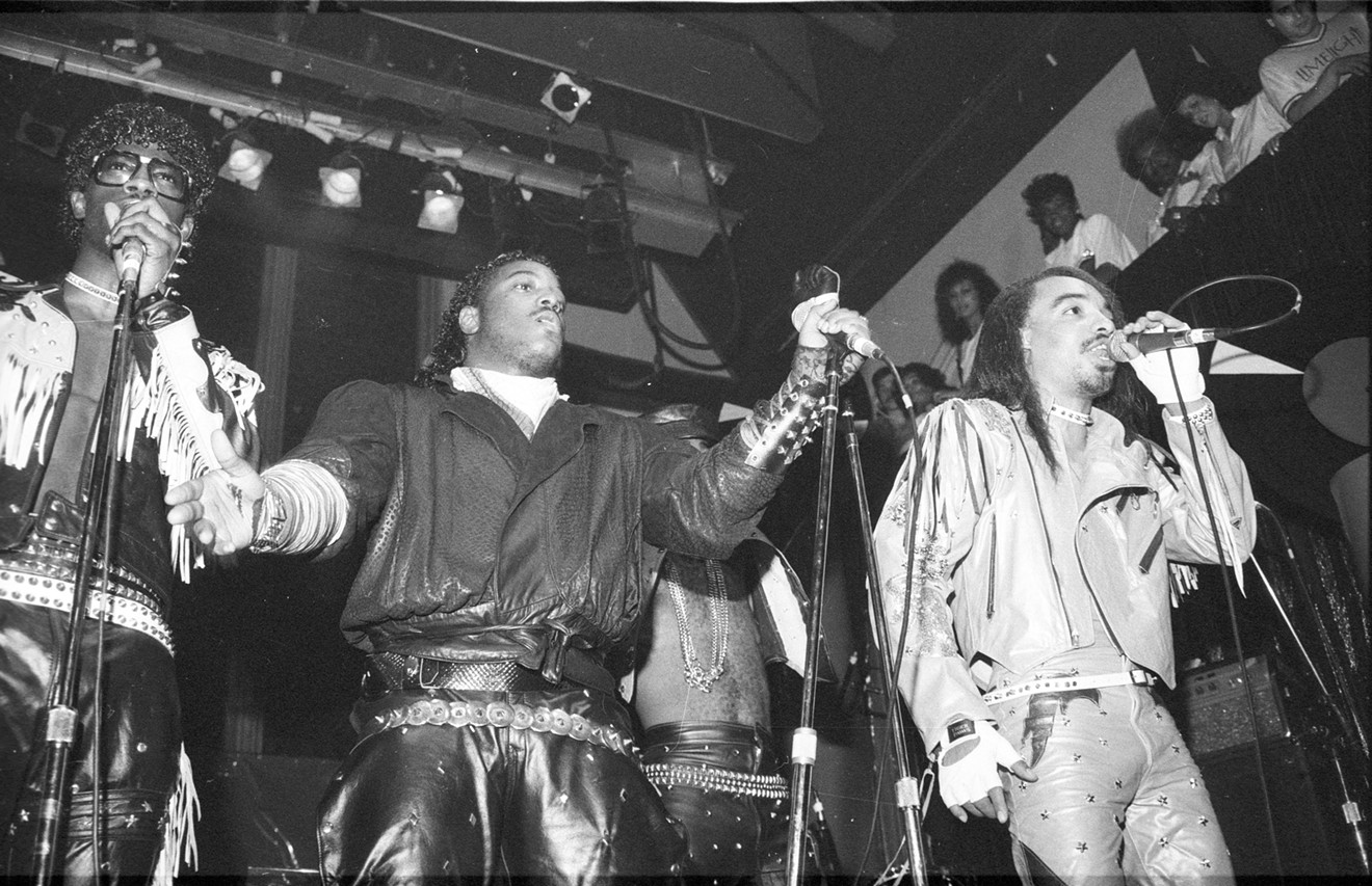Rap group "Grandmaster Flash & The Furious Five" perform onstage in circa 1984. (L-R) Lavon, Rahiem, Kidd Creole.