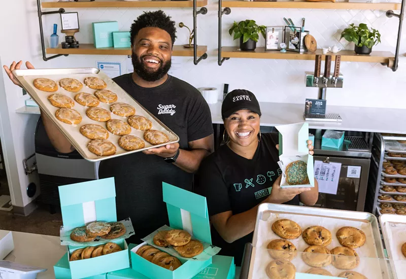 Image: Cookie Society owners Jeff and Marissa Allen in their Addison branch store.