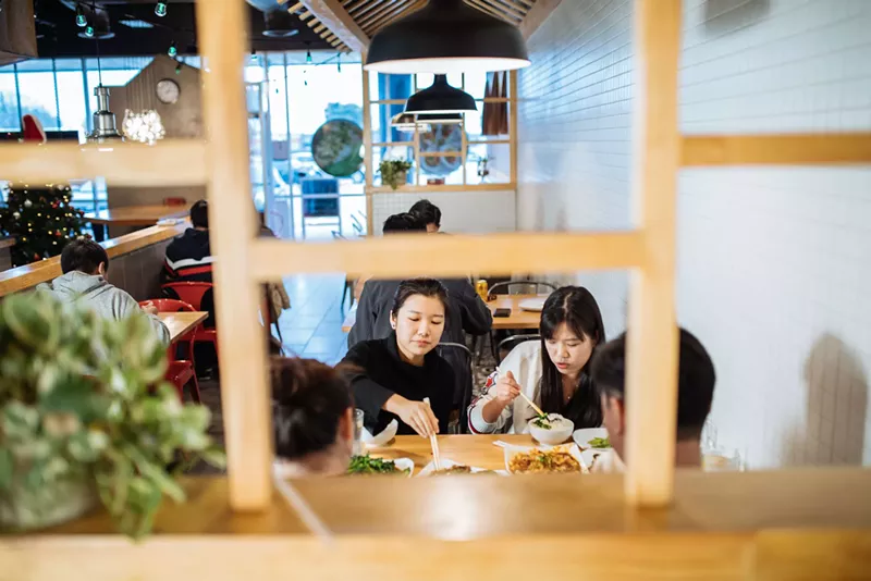 Image: Diners sample dishes at Big Claw, which opened in Plano in April with the goal of serving authentic Chinese dishes to Asian-American millennials.