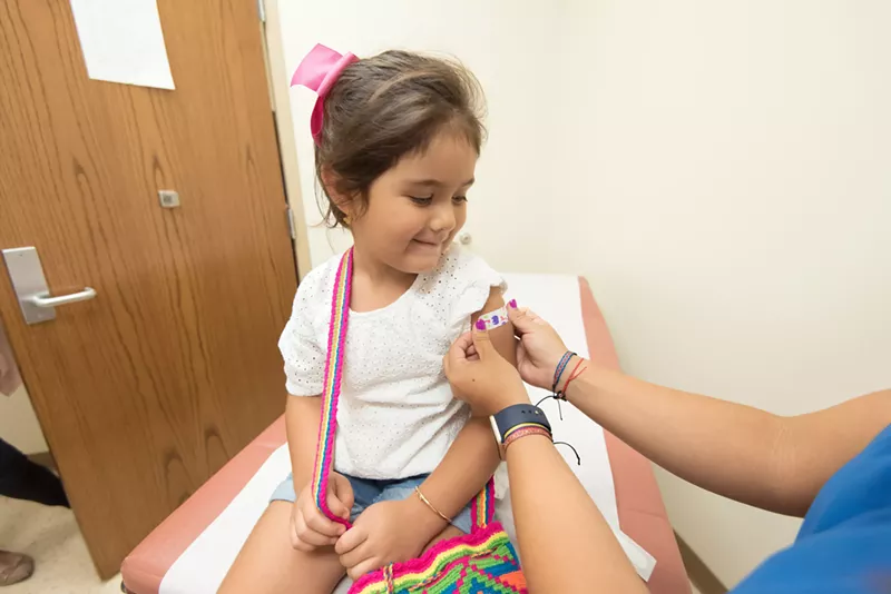 Image: Some Texans are reluctant to get their kids vaccinated.