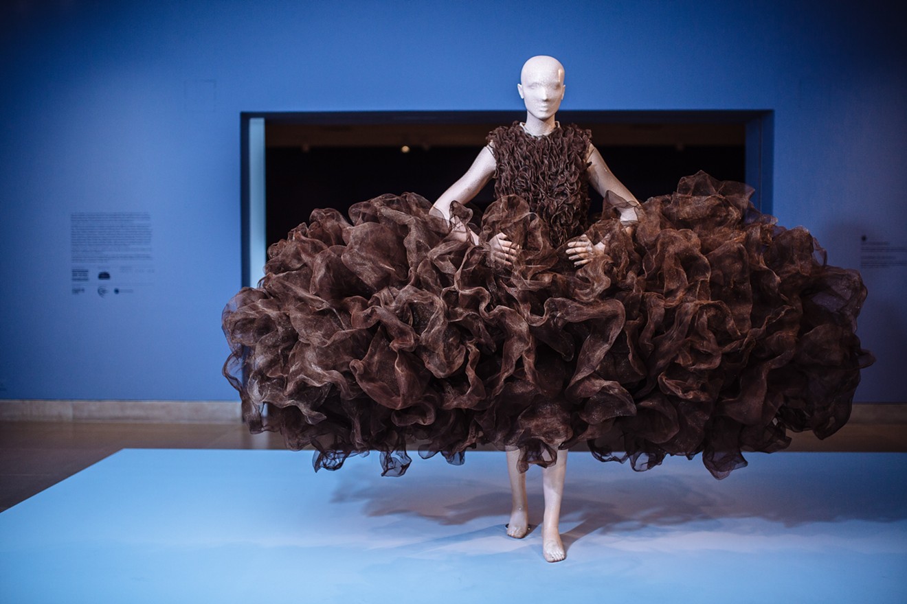 A dramatic gown (Refinery Smoke, 2008) elicits both the allure and the danger of toxic industrial fumes.