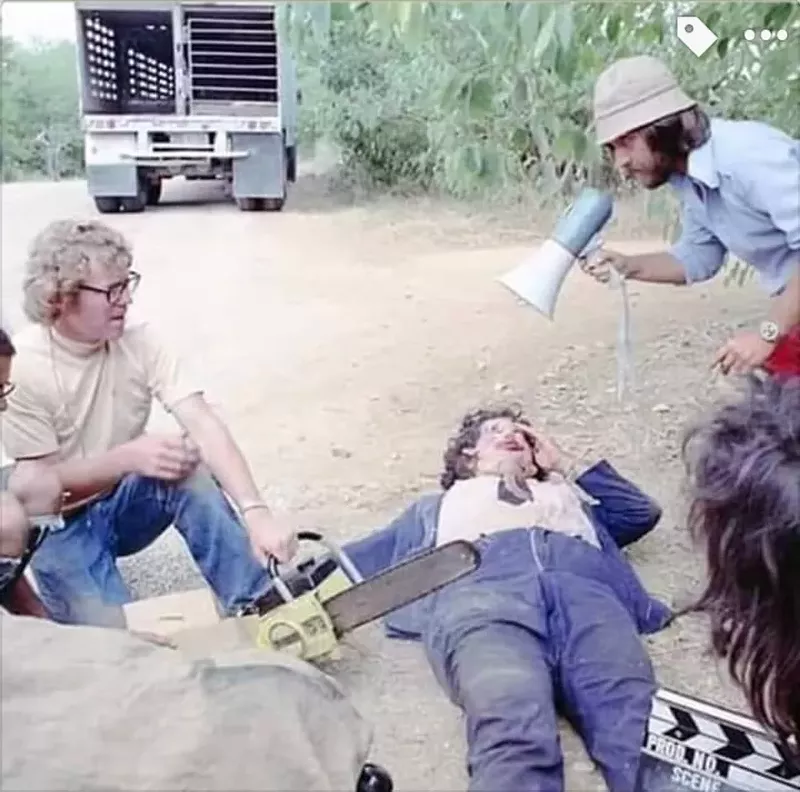 Image: The filming of the last scene of Texas Chainsaw Massacre: Ron Bozman (left), Gunnar Hansen (as Leatherface) and Tobe Hooper with megaphone.