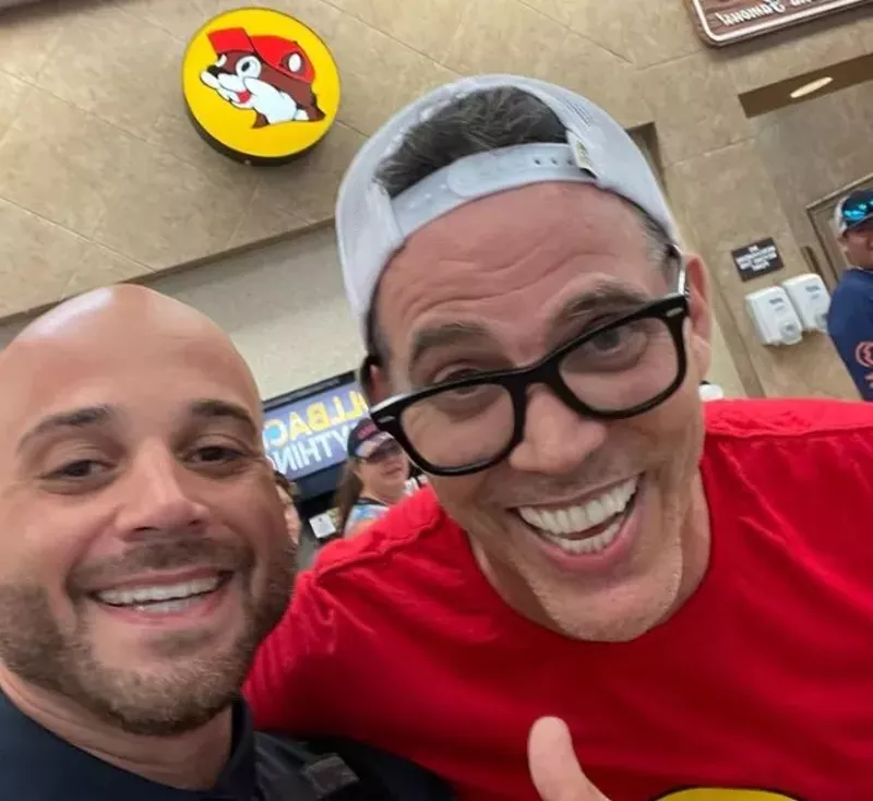Image: Sugar Land Police Sgt. Justin Pannell, left, took a selfie with Jackass star and stand-up comedian Steve-O, right, at a Buc-ee's location in Wharton.