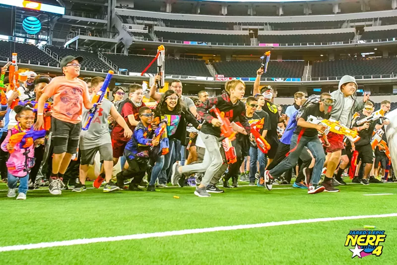 Image: A group of kids take to the field of AT&T Stadium in 2019 with their foam dart guns in tow for Jared's Epic Nerf Battle 4, an event that's returning on Friday and Saturday with Jared's Epic Blaster Battle 5 and 6.