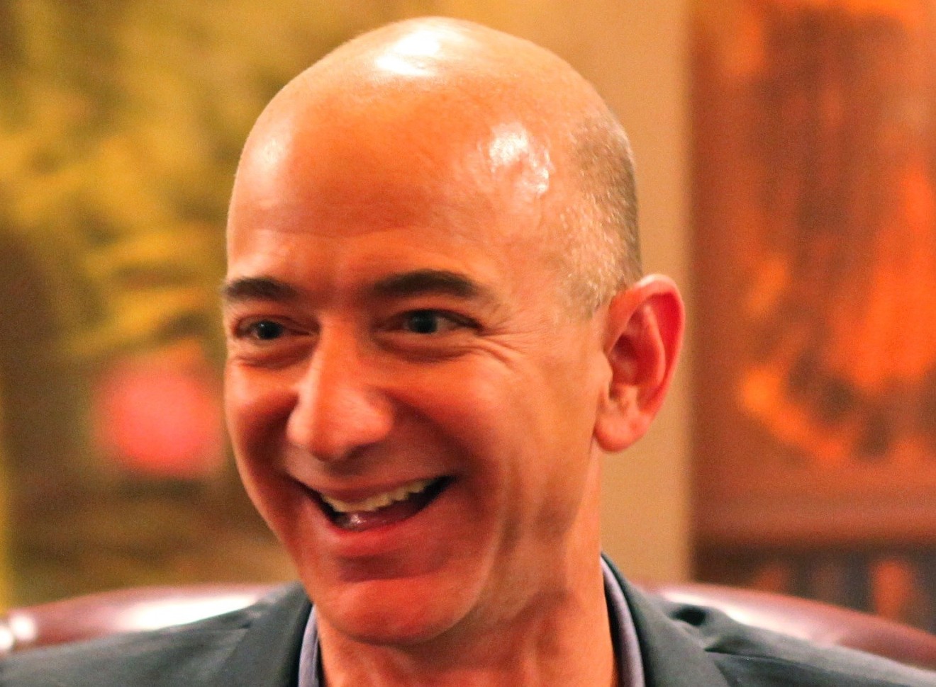 Amazon boss Jeff Bezos. Is that his coming-to-see-you smile or his so-long-sucker look?