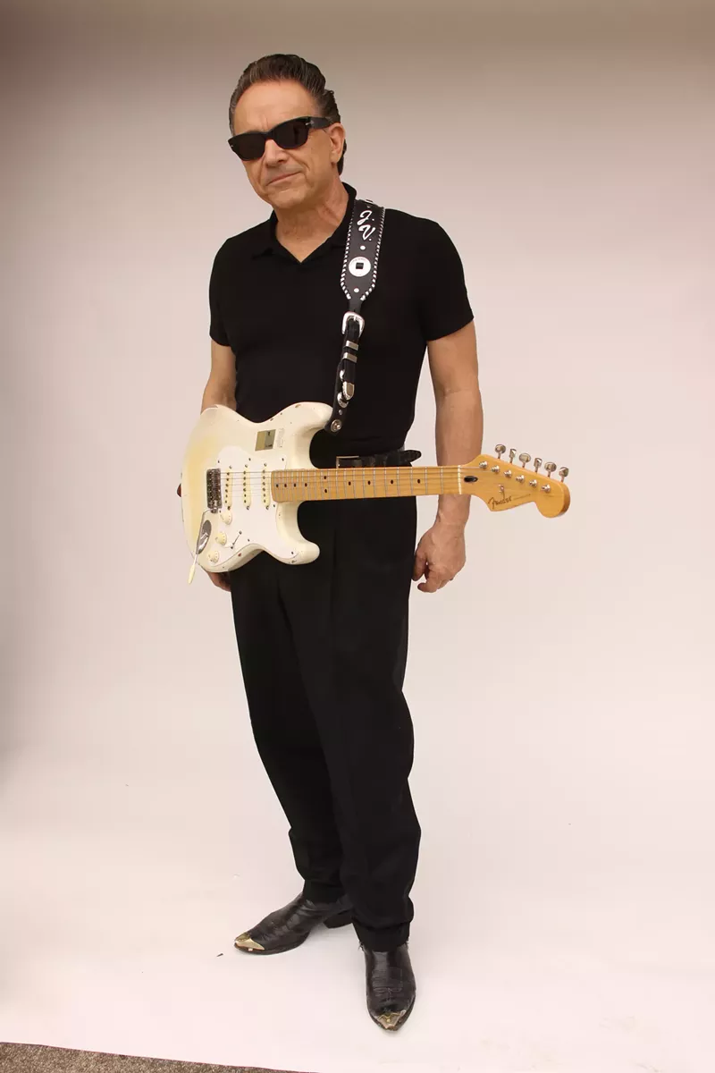 Image: Jimmie Vaughan performed at Levitt Pavilion despite the light mist.