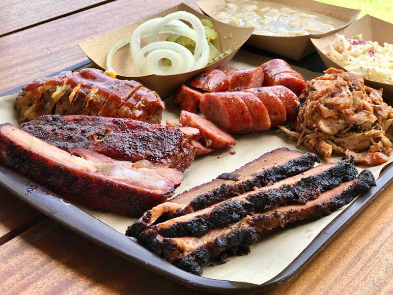Summers are for eating barbecue like this from Joe Riscky's.
